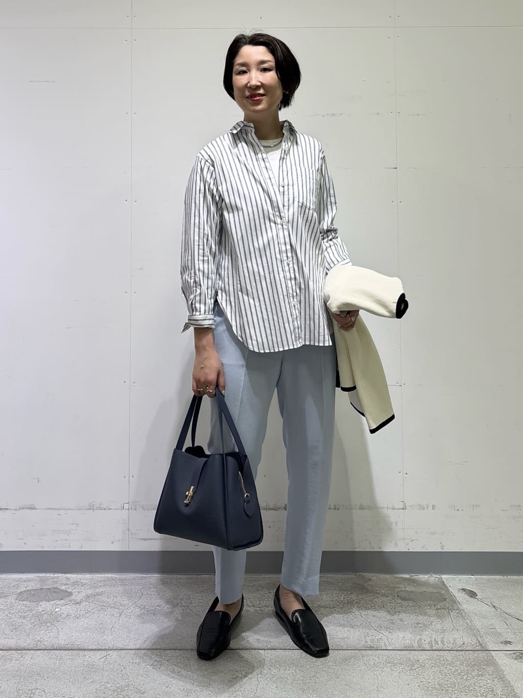 yuriさんの「INDIVI｜【洗える／UVケア／SETUP可】着る日傘テーパードパンツ」を使ったコーディネート