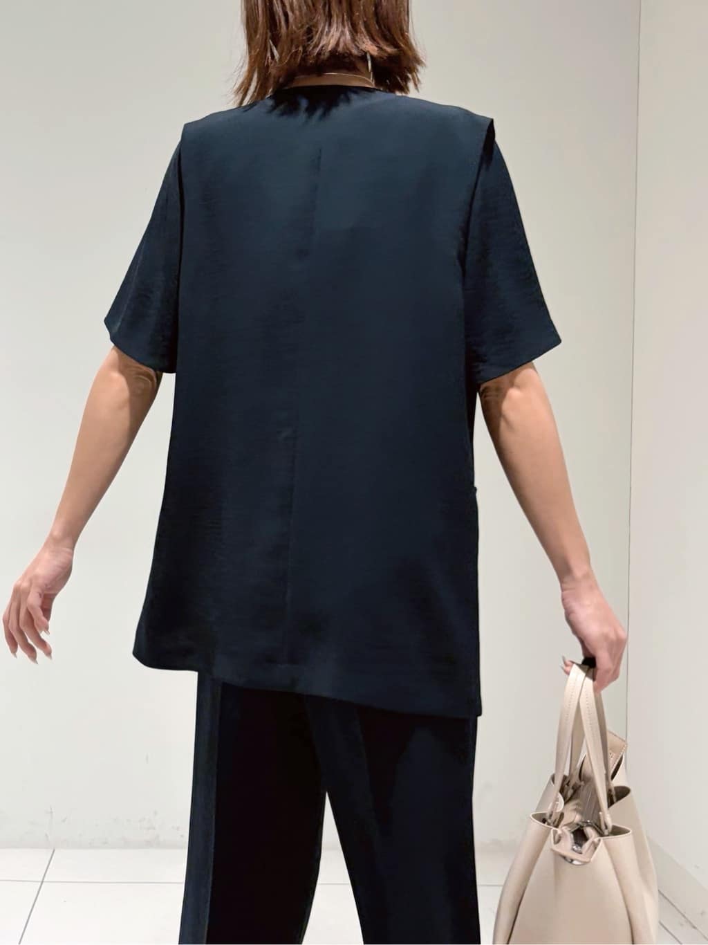 shioriさんの「INDIVI｜【洗える／多機能／SETUP可】着る日傘ジレジャケット」を使ったコーディネート