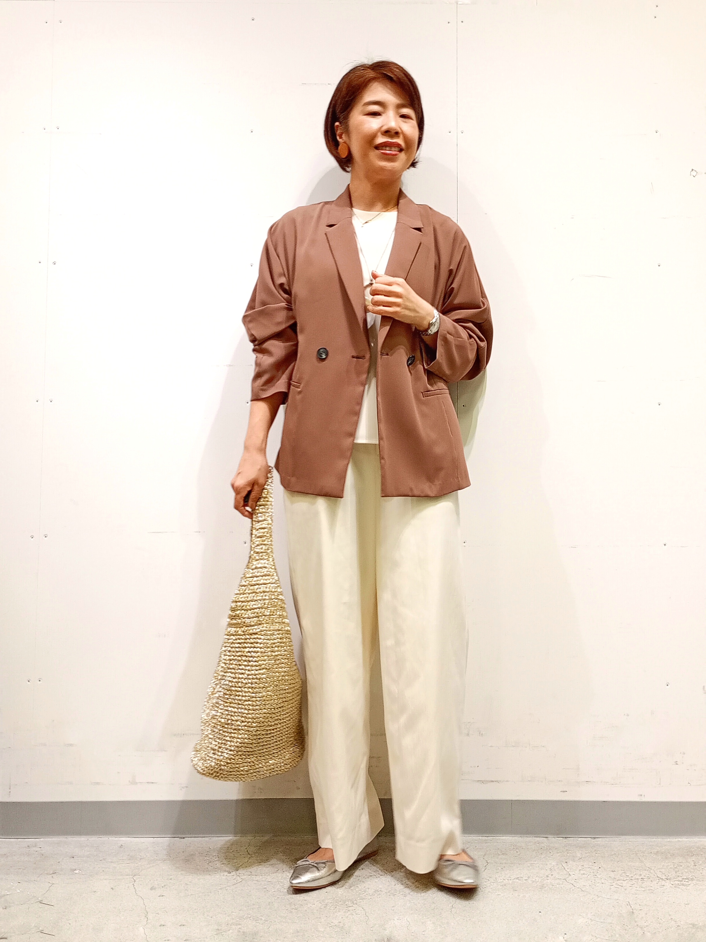Kさんの「INDIVI｜【さらに軽く軽快！／着る日傘】ドルマントップス」を使ったコーディネート