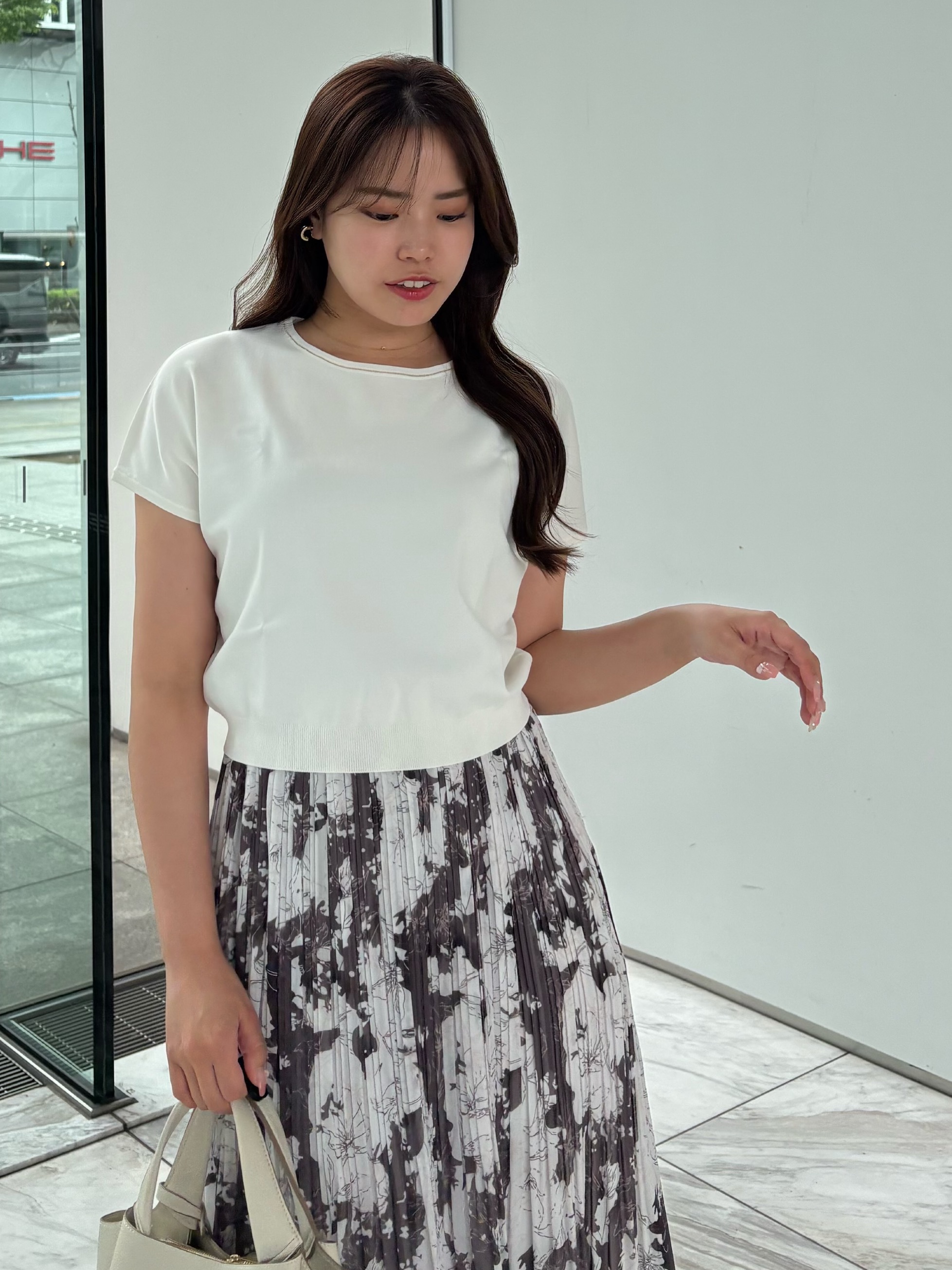 MISAKIさんの「COUP DE CHANCE｜【手洗い可】ニット&花柄プリントスカート」を使ったコーディネート
