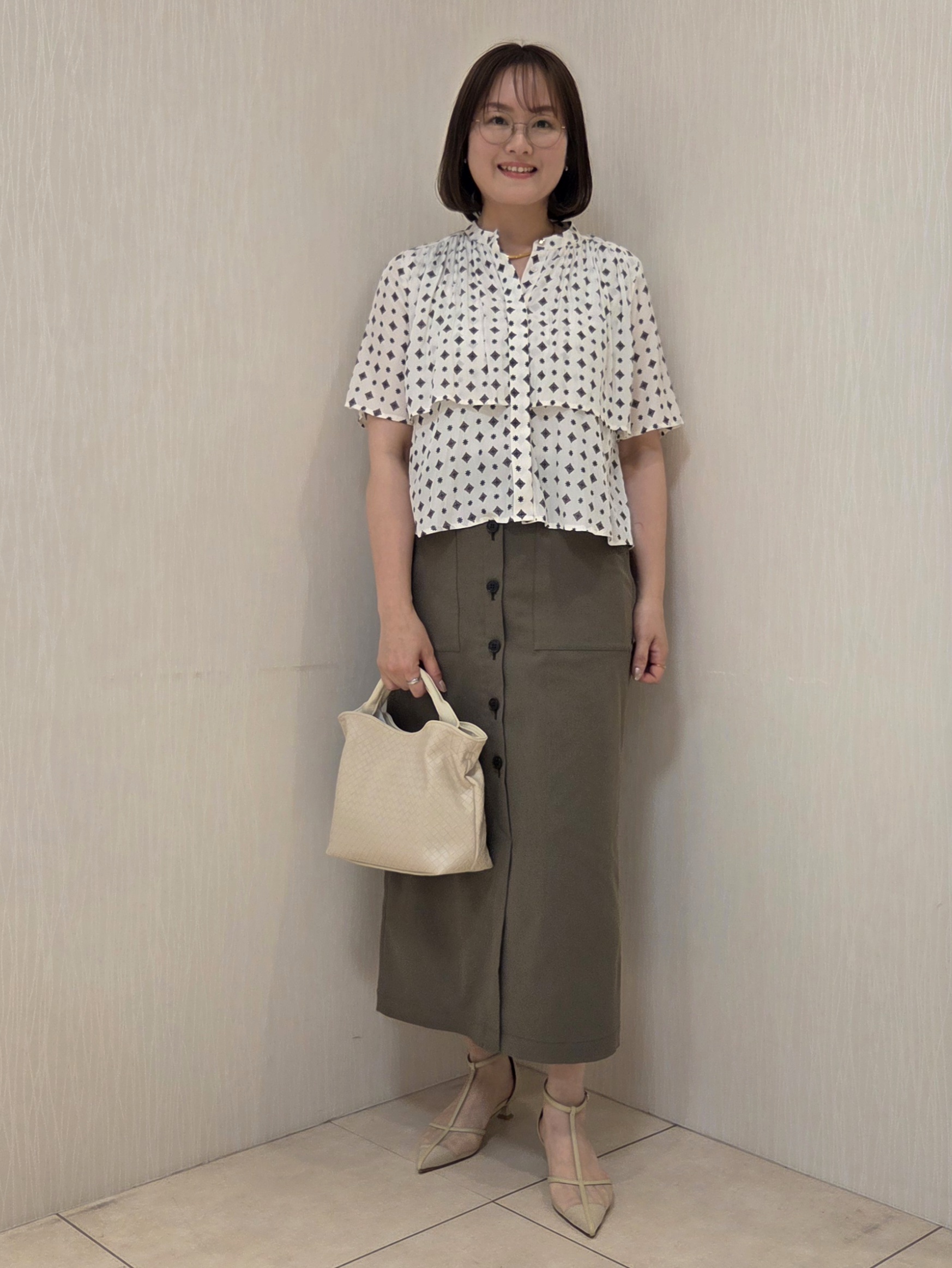 naokoさんの「UNTITLED｜【接触冷感/UVカット/吸水速乾/遮熱】ツイルボタンディティールスカート」を使ったコーディネート