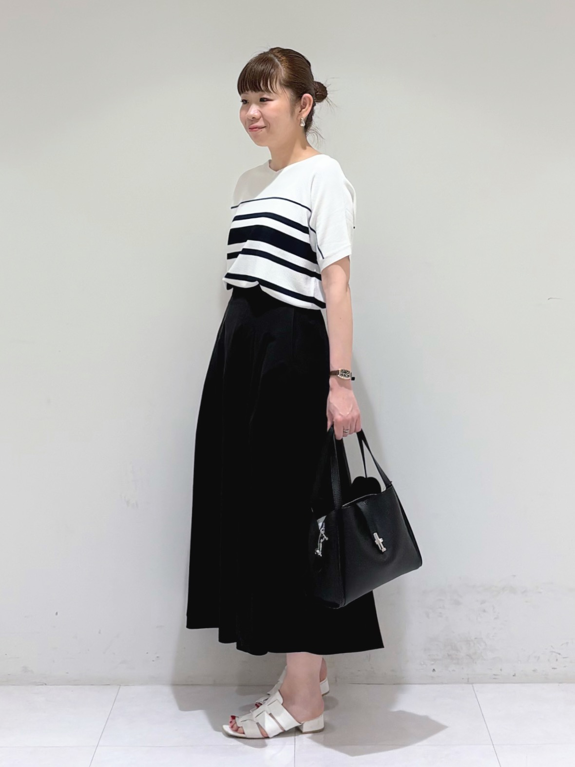 tsuyuさんの「INDIVI｜【合皮／ミドルサイズ】春カラーフォルムバッグ」を使ったコーディネート