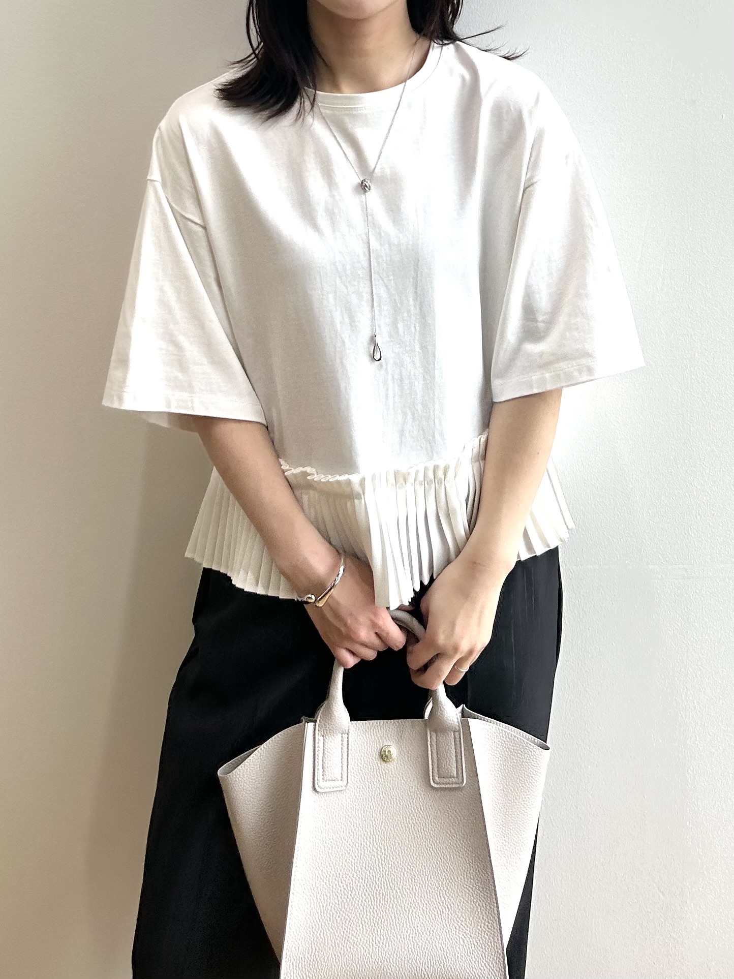 RINAさんの「OPAQUE.CLIP｜プリーツデザインドッキングトップス」を使ったコーディネート