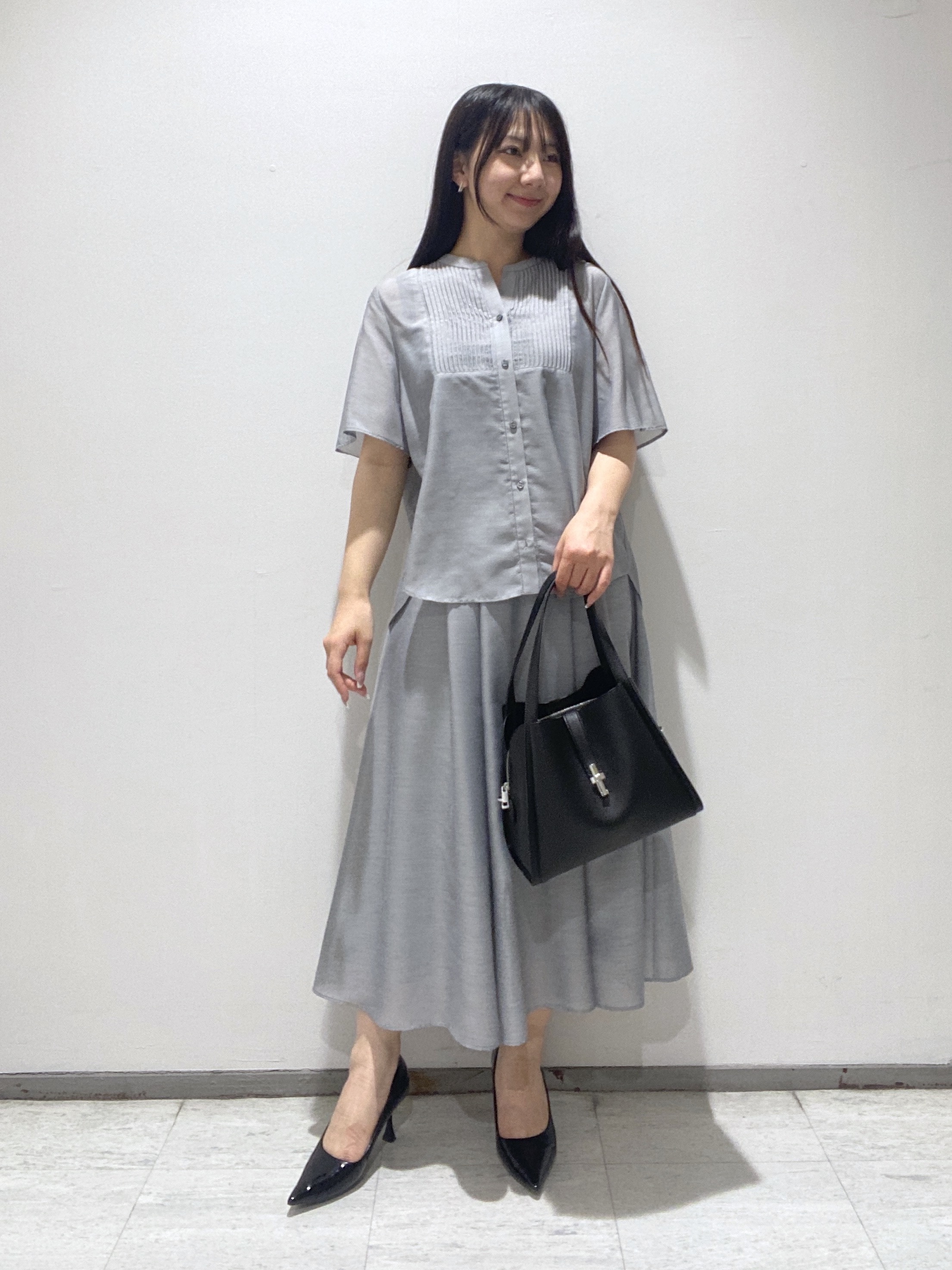 meiさんの「INDIVI｜【合皮／ミドルサイズ】春カラーフォルムバッグ」を使ったコーディネート