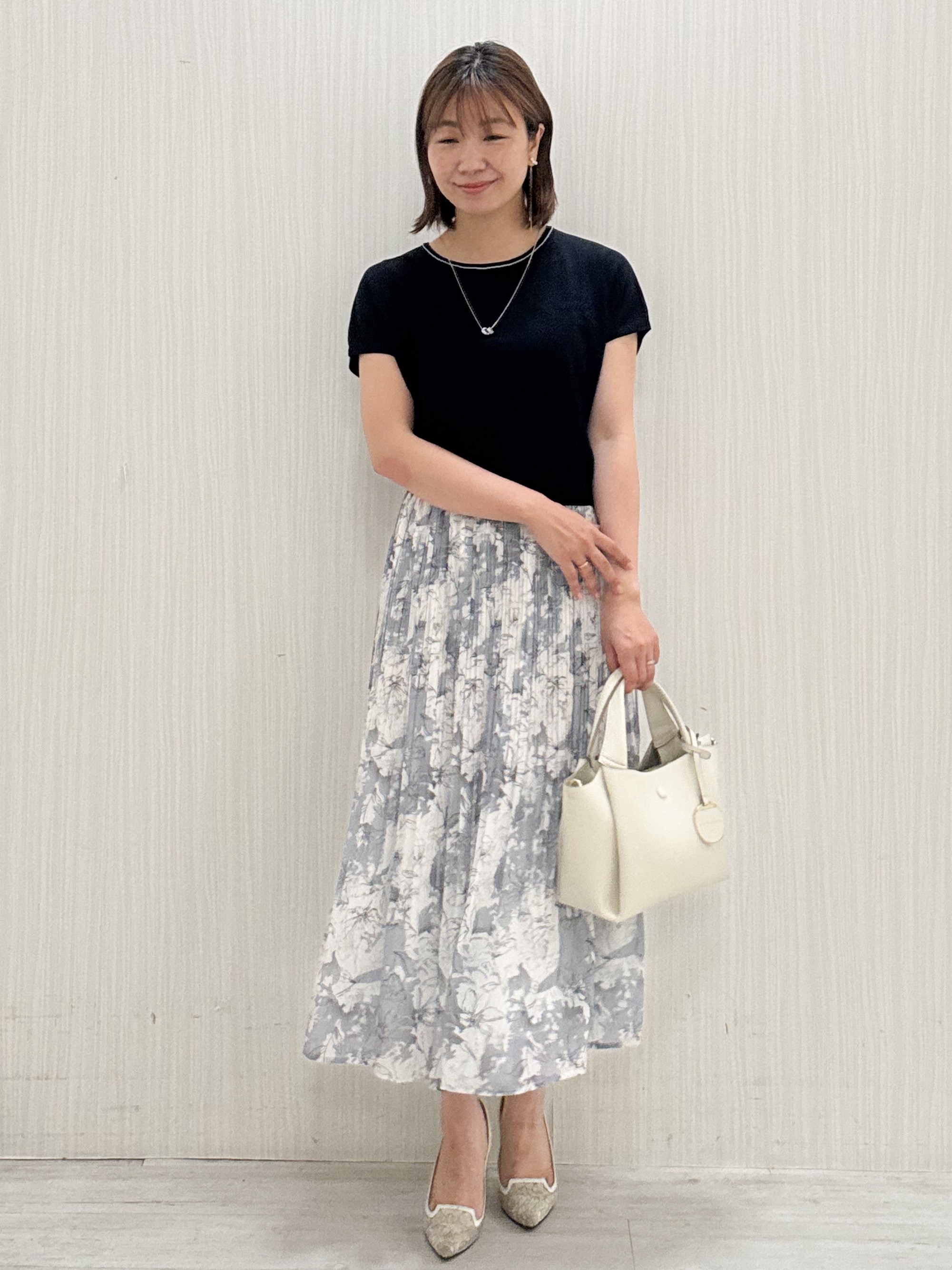 yuさんの「COUP DE CHANCE｜【手洗い可】ニット&花柄プリントスカート」を使ったコーディネート