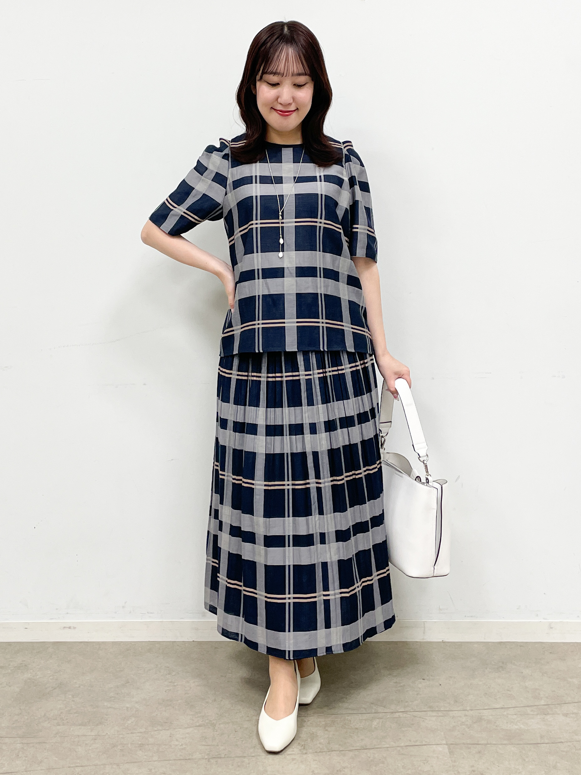 yukariさんの「Reflect｜【セットアップ／手洗い可】チェック柄パフスリーブブラウス」を使ったコーディネート