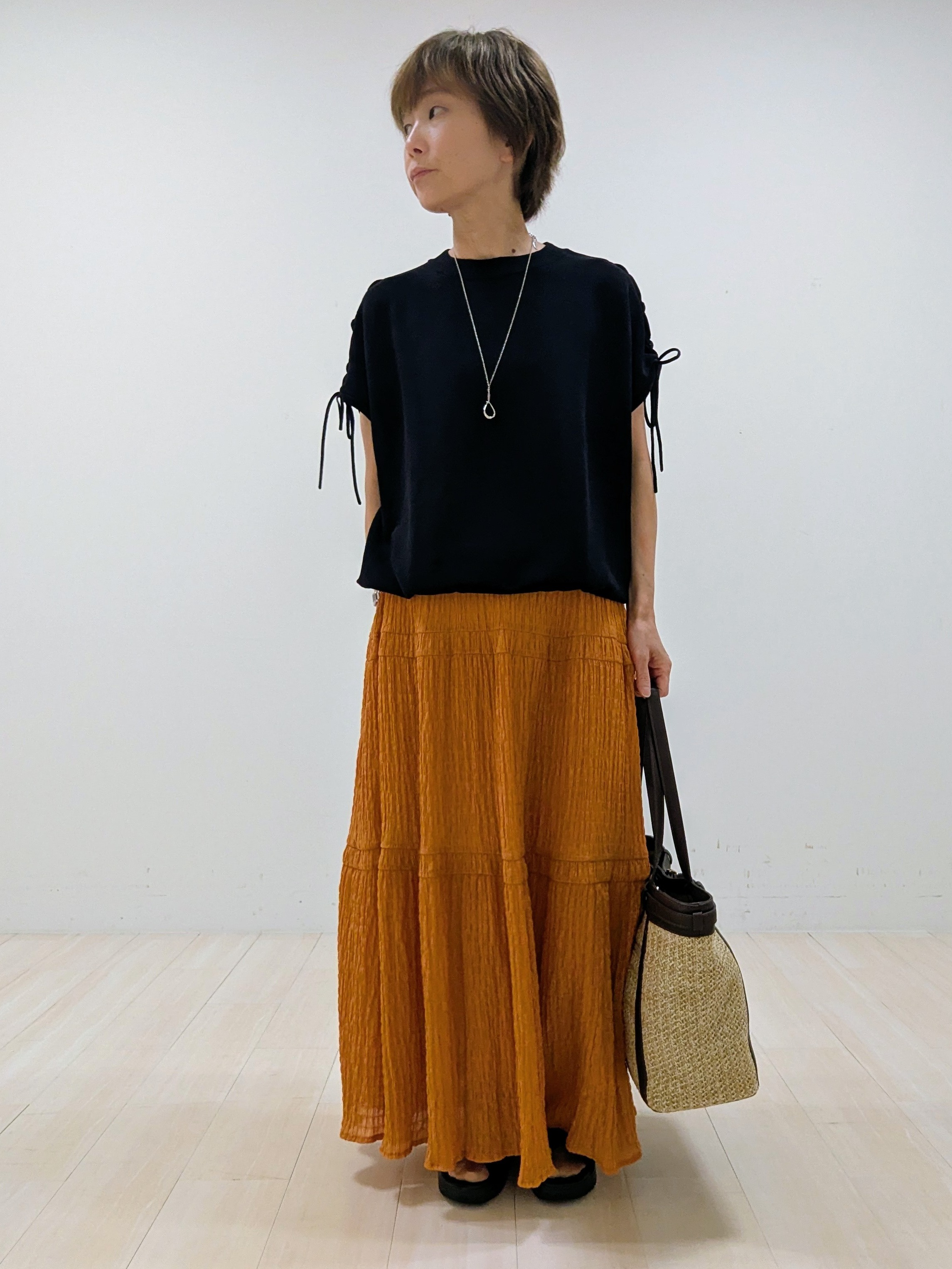 nishiさんの「Reflect｜レースアップスリーブデザインニット」を使ったコーディネート