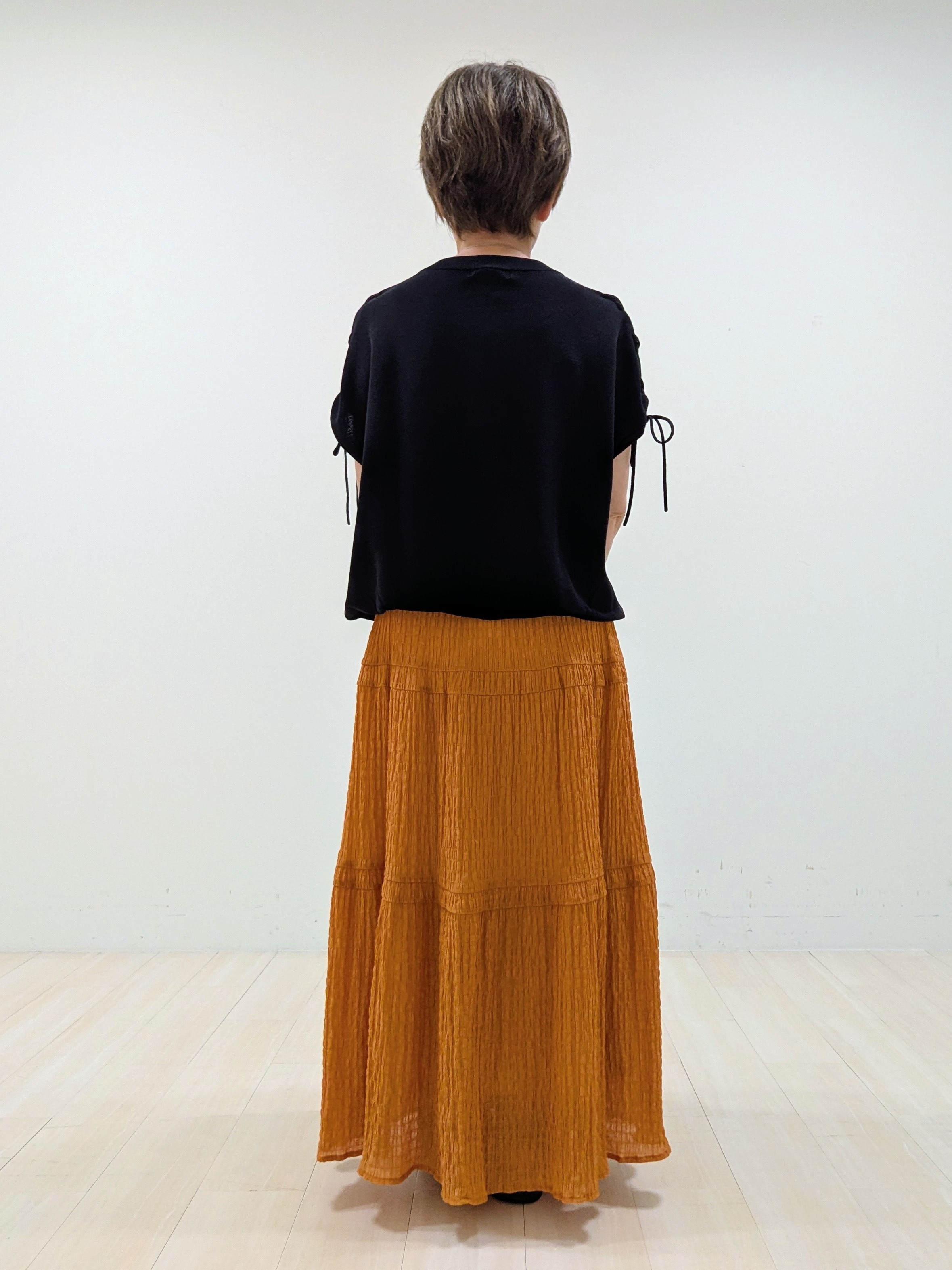 nishiさんの「Reflect｜レースアップスリーブデザインニット」を使ったコーディネート