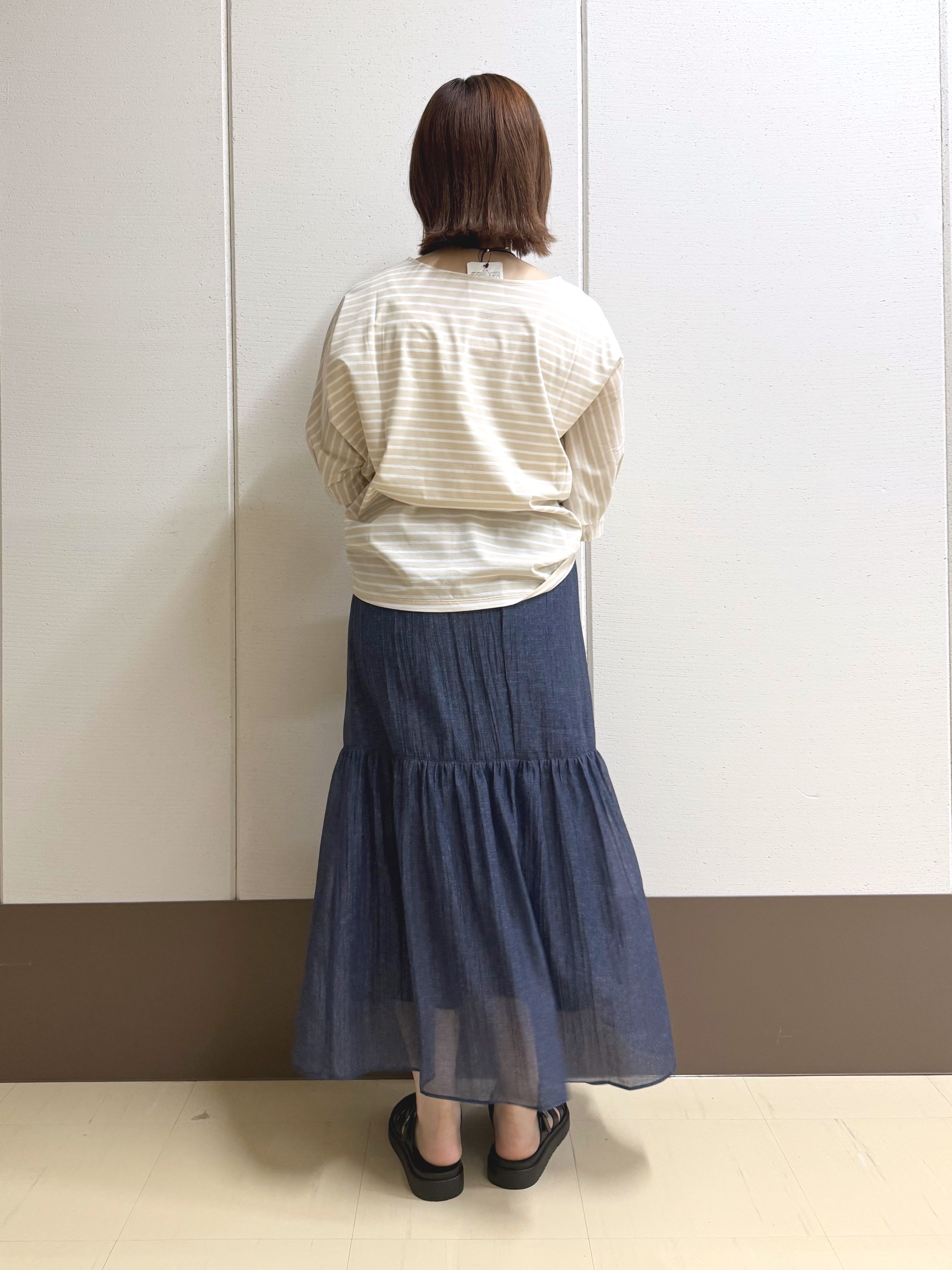 Rikoさんの「INDIVI｜【体型カバー】ボーダードルマントップス」を使ったコーディネート