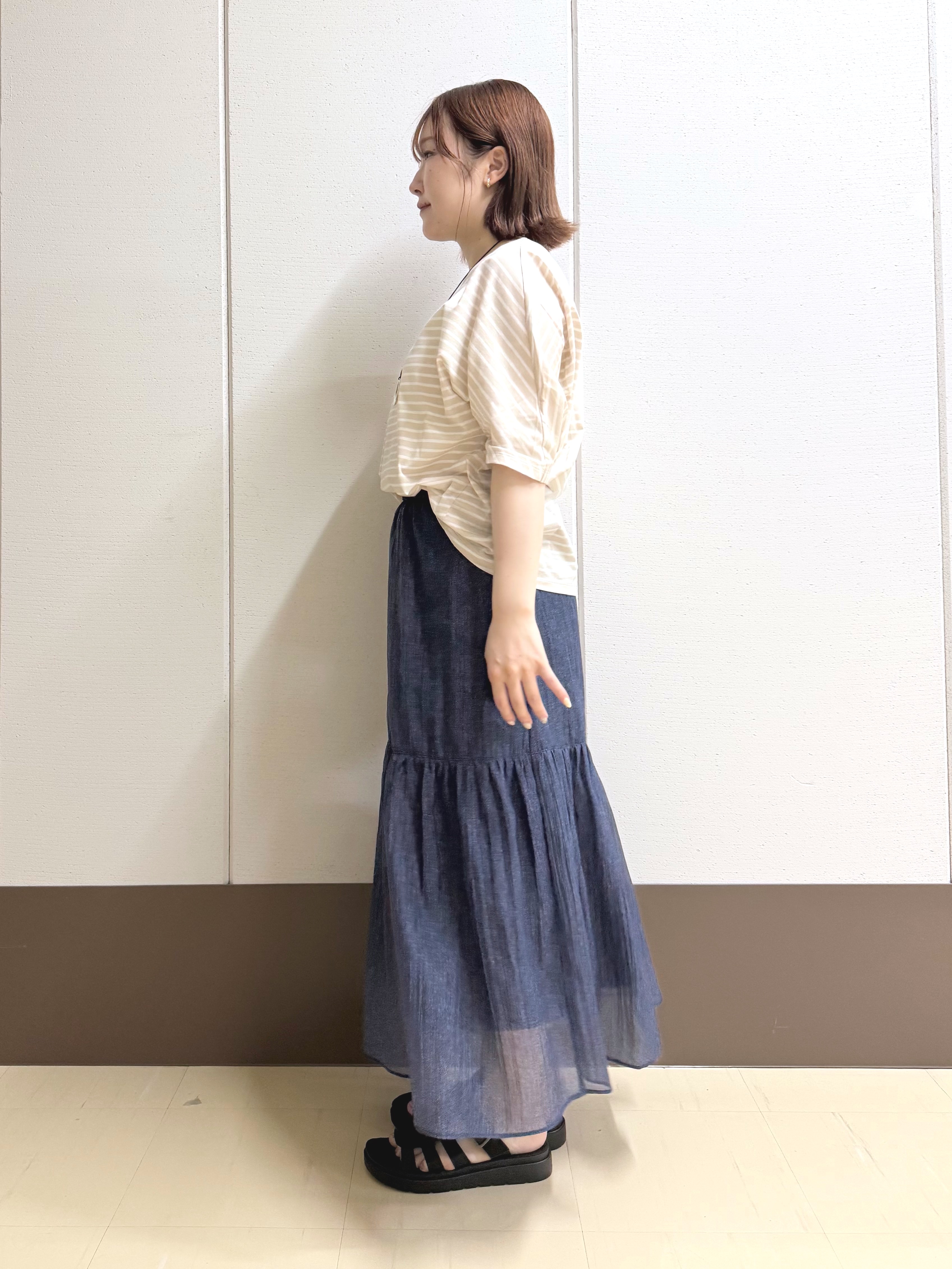 Rikoさんの「INDIVI｜【体型カバー】ボーダードルマントップス」を使ったコーディネート