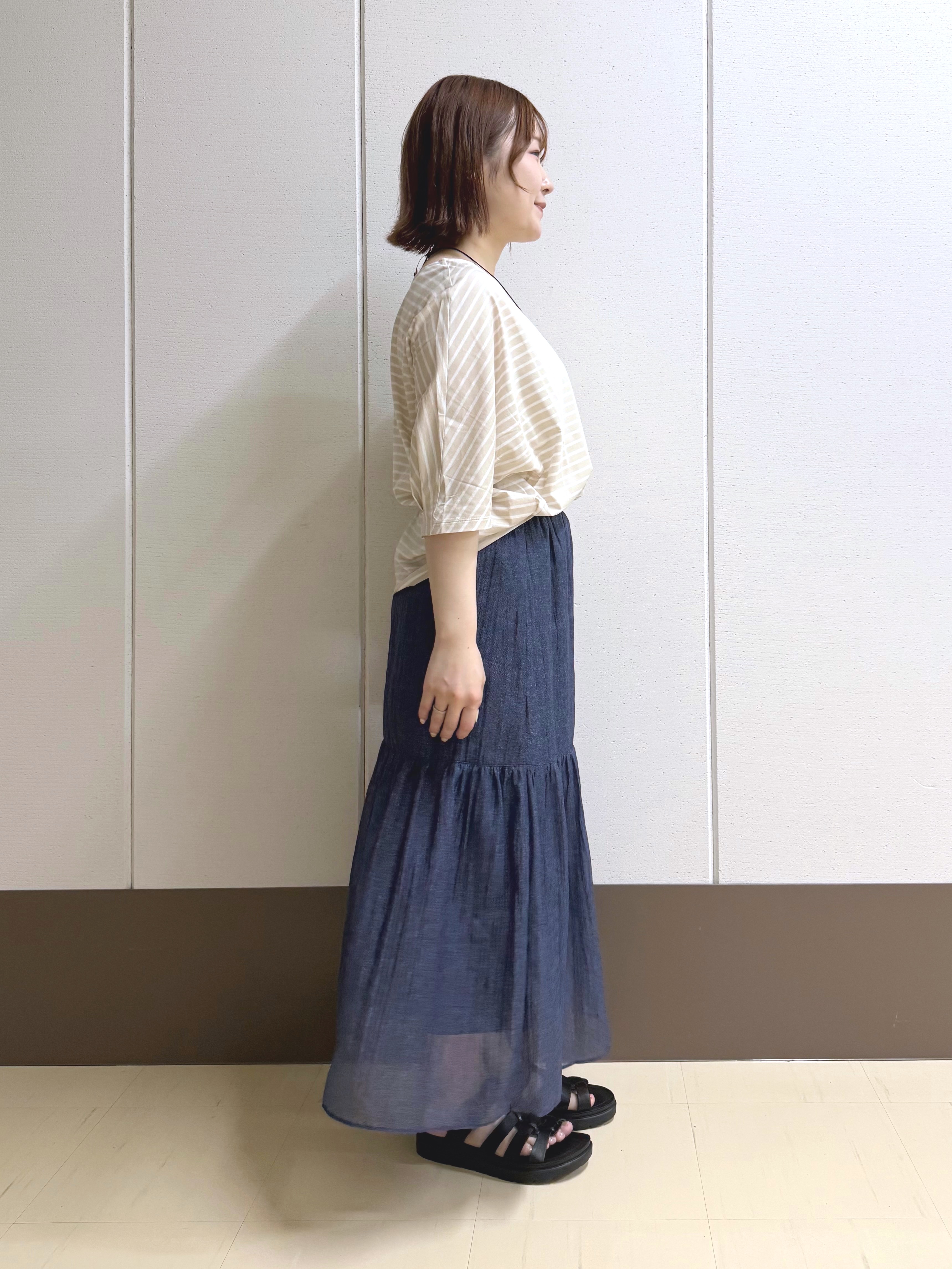 Rikoさんの「INDIVI｜【体型カバー】ボーダードルマントップス」を使ったコーディネート