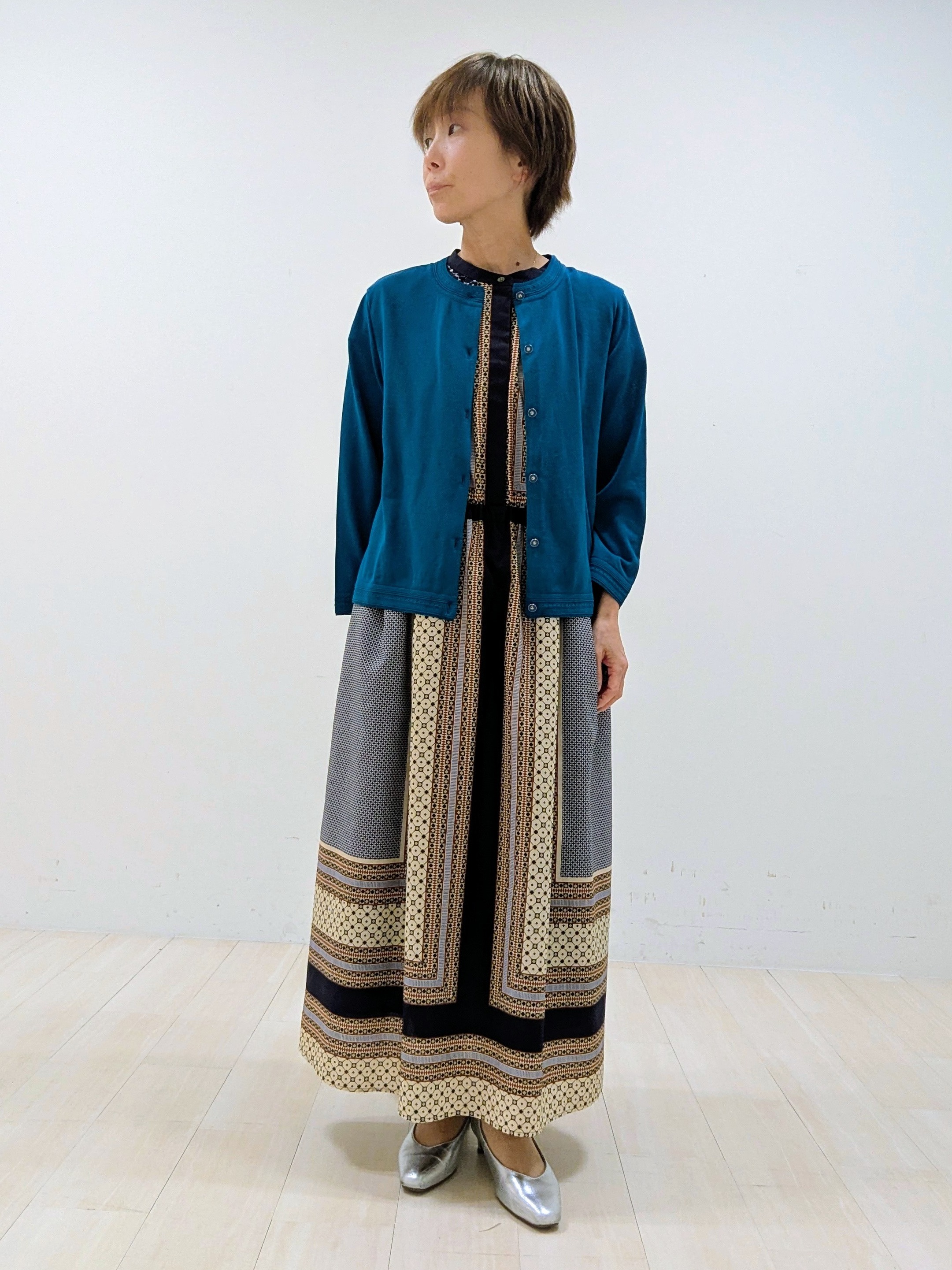 nishiさんの「Reflect｜七分袖ニットカーディガン」を使ったコーディネート