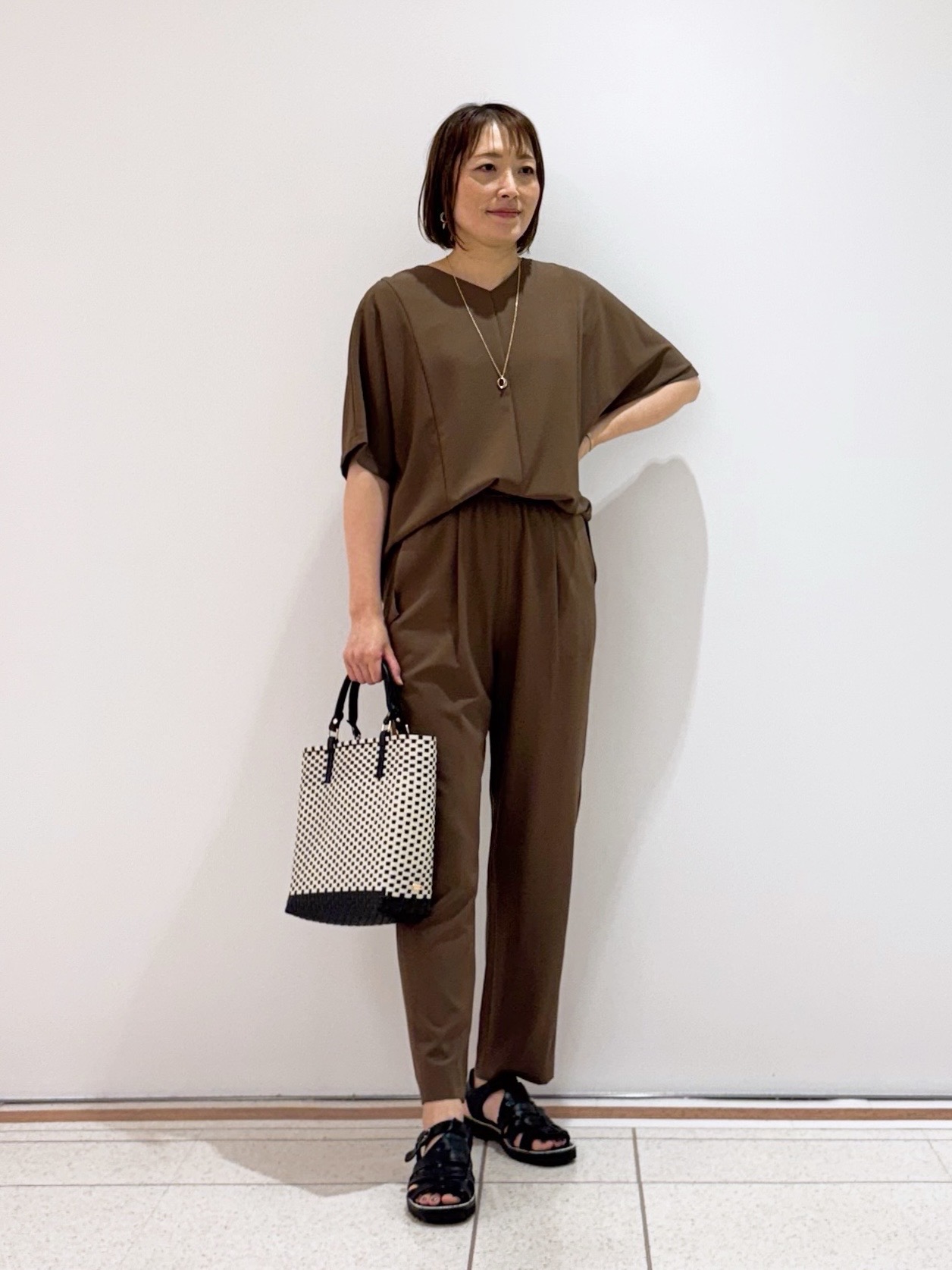 mikaさんの「INDIVI｜【着る日傘】ドルマントップス」を使ったコーディネート