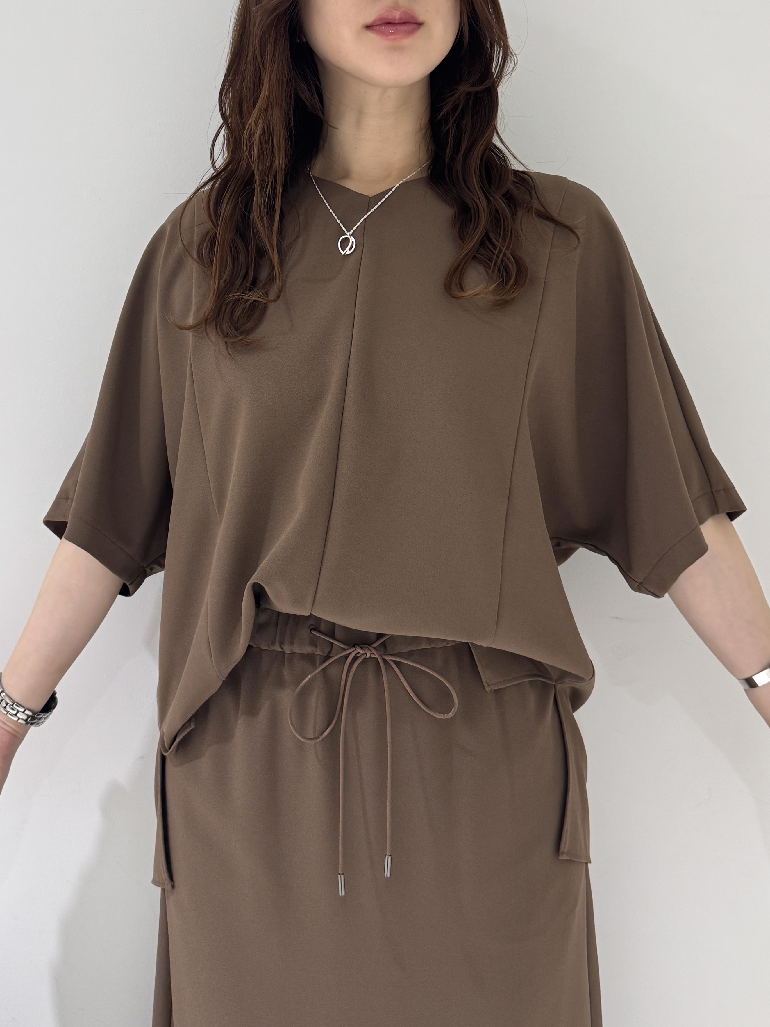 そんさんの「INDIVI｜【着る日傘】ドルマントップス」を使ったコーディネート