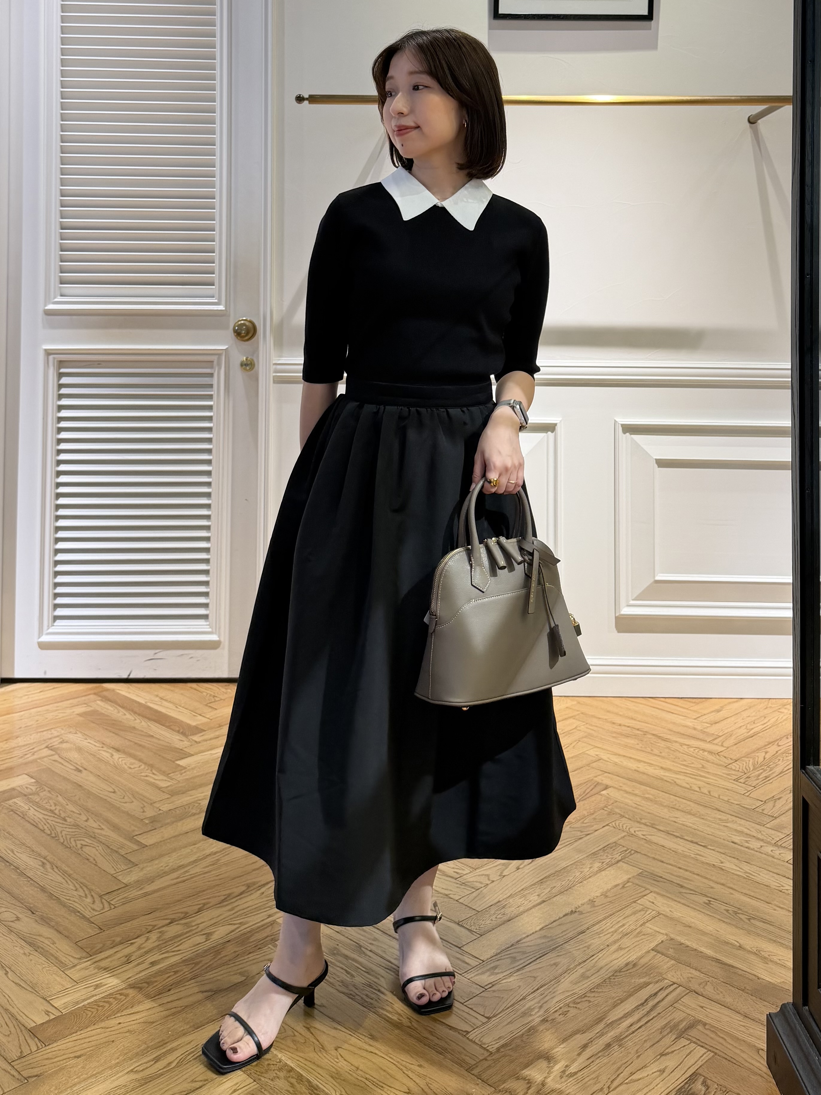 つじ まこさんの「DRESSTERIOR｜バイカラーニットコンビワンピース」を使ったコーディネート