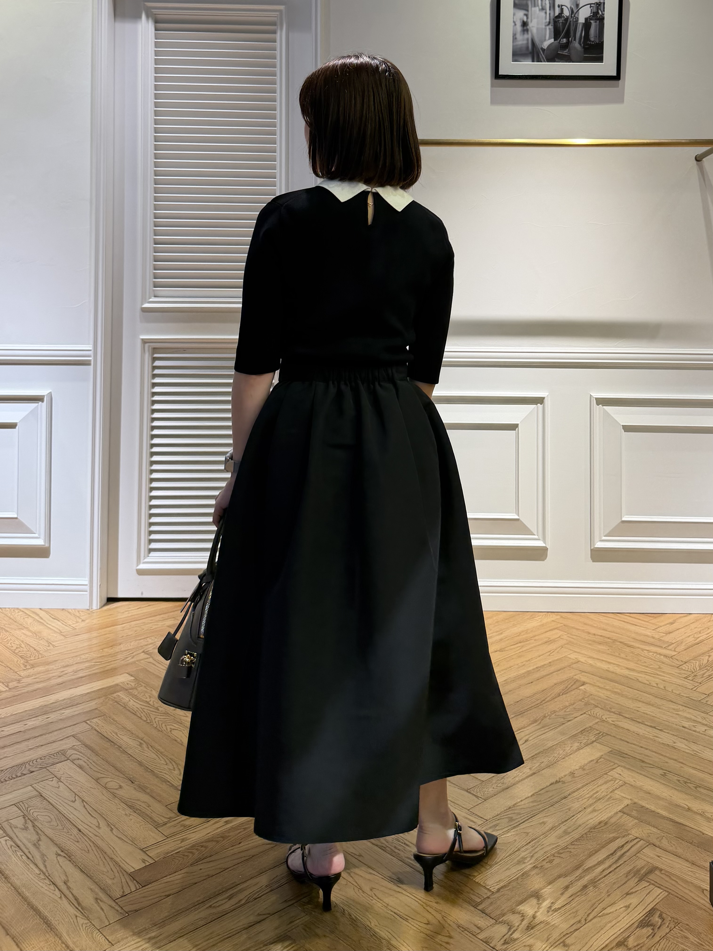 つじ まこさんの「DRESSTERIOR｜バイカラーニットコンビワンピース」を使ったコーディネート