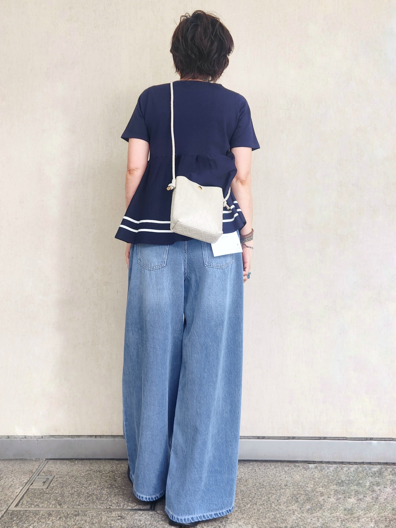 milkyさんの「OPAQUE.CLIP｜【UVケア】裾ラインペプラムニット《洗濯機OK》」を使ったコーディネート