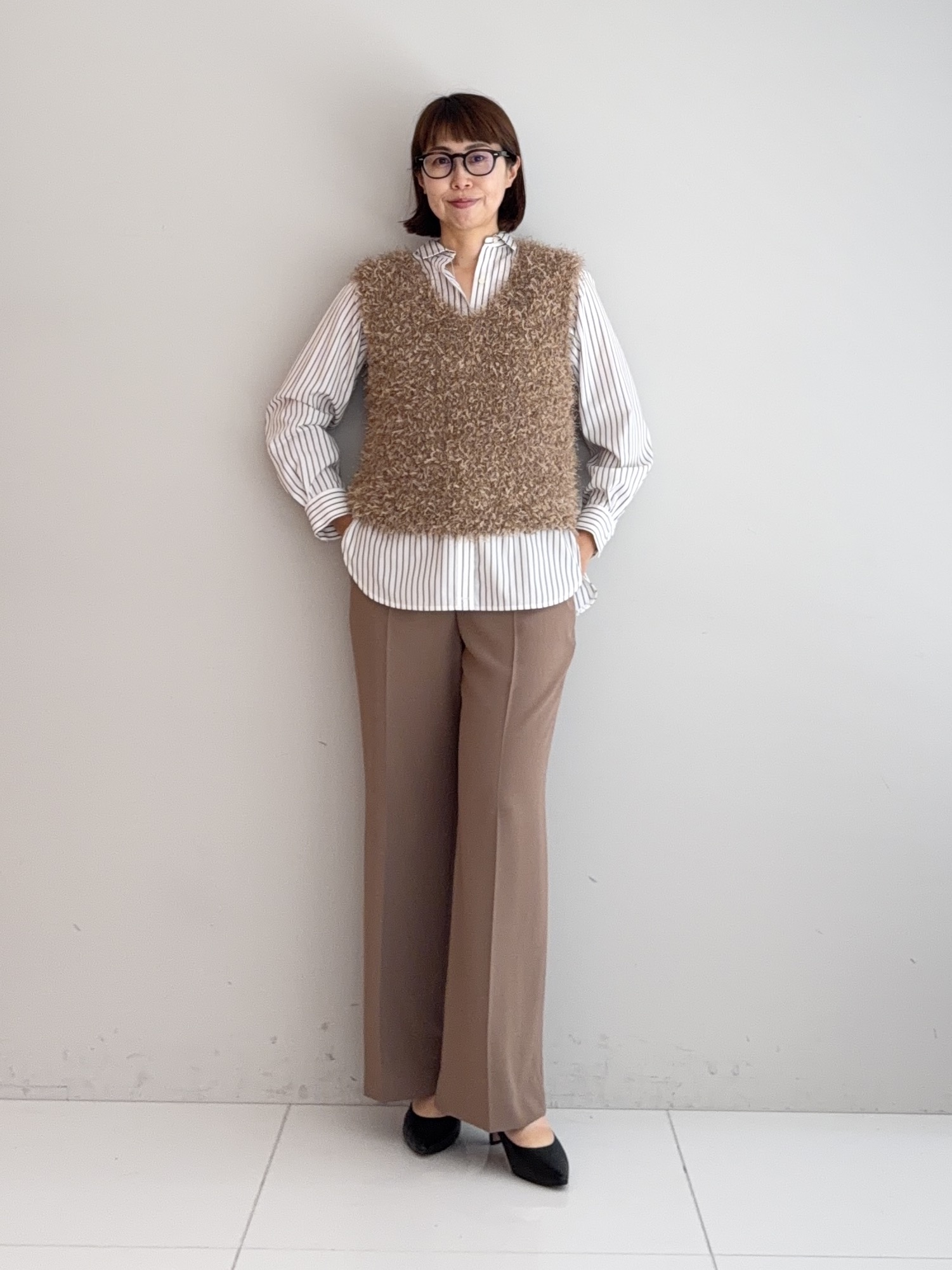 murayamaさんの「INDIVI｜【洗える】ファンシーヤーンVネックニットベスト」を使ったコーディネート