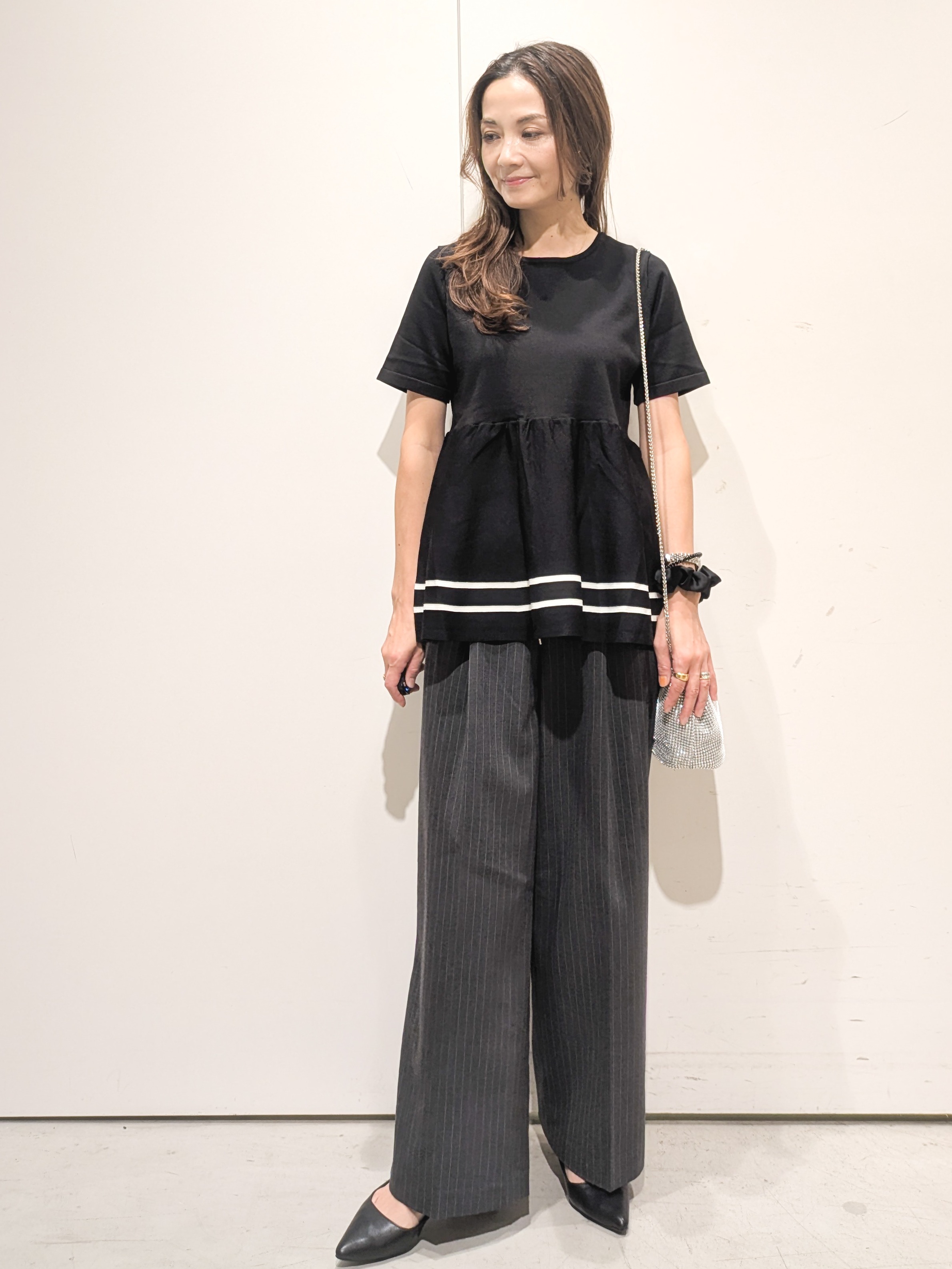 machiさんの「OPAQUE.CLIP｜【UVケア】裾ラインペプラムニット《洗濯機OK》」を使ったコーディネート
